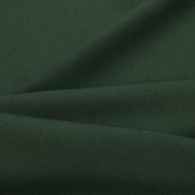 Ткань костюмная 21010 2076, 225 гр/м2, шир.150см, цвет т.зеленый - купить в Саратове. Цена 390.73 руб.